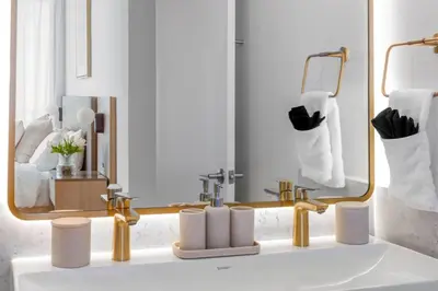 a bathroom with a sink and a mirror at 3701 Kaseya Center 2 Bdr Apt with Pool and Gym in Miami