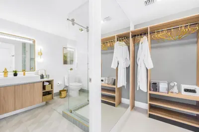 a bathroom with a shower and a sink at 3005 golden305 2BR Apt mins to Wynwood and Brickell w Pool a Gym and PS5 in Miami