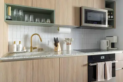 a kitchen with a sink and a microwave at 3209 Apt in Heart of Downtown with Pool a Gym and Spa in Miami