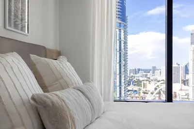 a living room with a view of a city from a window at 3209 Apt in Heart of Downtown with Pool a Gym and Spa in Miami
