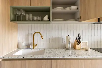 a kitchen with a sink and a counter top at 2414 Chic Stay in Miami Downtown with Bay and City Views a Pool and Gym in Miami