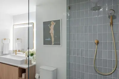 a bathroom with a shower and a toilet and a sink at 3002 Downtown Miami apt in front of Kaseya Center with Gym and Pool in Miami