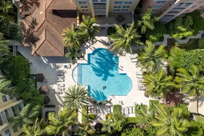 an overhead view of a swimming pool at a resort at Aventura Mall Apt with Pool a Tennis Court and Free parking in Aventura
