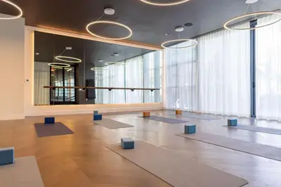 a large room with yoga mats on the floor at 2002 One bedroom unit for 4 Ppl next to Kaseya Center with Gym and Pool in Downtown Miami in Miami