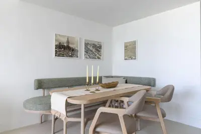 a dining room with a table and chairs at 4513 a 1-Bedroom Apt with Pool and Gym next to Kaseya Center in Miami