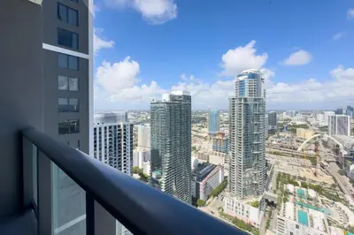 a view of a city from the balcony of a building at 4513 a 1-Bedroom Apt with Pool and Gym next to Kaseya Center in Miami