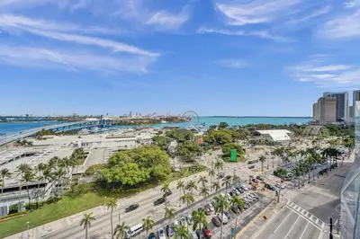 an aerial view of a city with palm trees and a street at Lux Studio Miami and Bay views in Miami