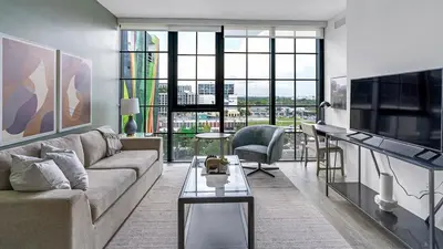 a living room with a couch and a table at The Juliet V Vibe 8700 in Miami