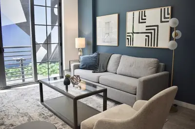 a living room with a couch and a table at The Juliet VI Vibe 8701 in Miami