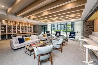 a living room with couches and chairs and tables at The Juliet VI Vibe 8701 in Miami