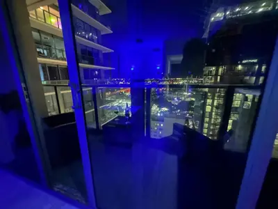 a view of a city at night from a building at Luxe Ventures Miami in Miami