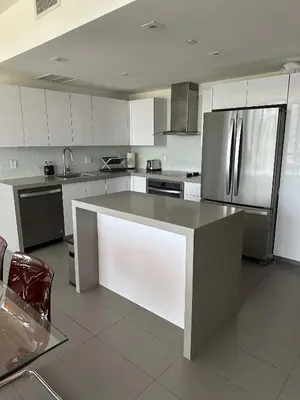 a kitchen with white cabinets and stainless steel appliances at Luxury 2BR Skyline Balcony Free Parking by Palermo Home Miami in Miami