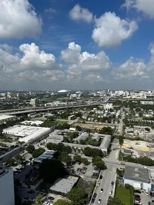 an aerial view of a city with buildings and cars at Luxury 2BR Skyline Balcony Free Parking by Palermo Home Miami in Miami
