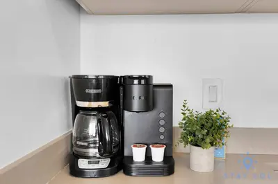 a coffee maker sitting on top of a counter at Beachfront Balcony Apartment Amenities in Hollywood