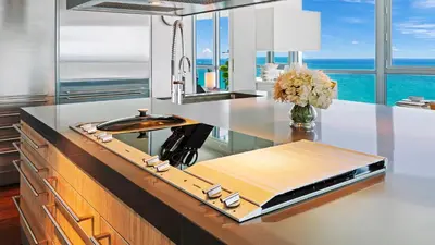 a kitchen with a counter with a record on it at The Setai Miami Private Luxury Residences in Miami Beach
