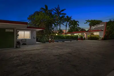 an empty parking lot in front of a building at Pet-Friendly 1BR Studio w/ Parking & BBQ, Hollywood in Hollywood