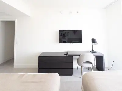a white room with a desk and a chair at 3 BDR Beach Bliss in Hollywood
