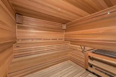 a sauna with wooden walls and wooden flooring at Stylish Studio with Pool View at the Heart of Downtown Doral in Miami