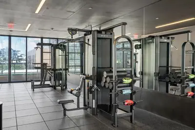 a gym with several exercise equipment in a building at Downtown Miami 2BR-2BA Panoramic City Views in Miami