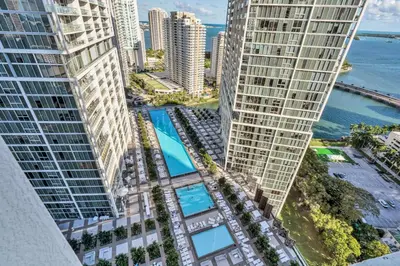 an aerial view of two tall buildings with a pool at Icon Brickell Gem 2-BR Oasis with Amazing Views in Miami