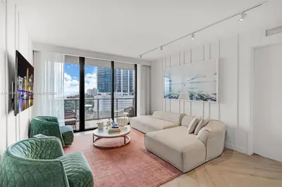 a living room with a couch and two chairs at W South Beach 1B Residence Ocean View in Miami Beach
