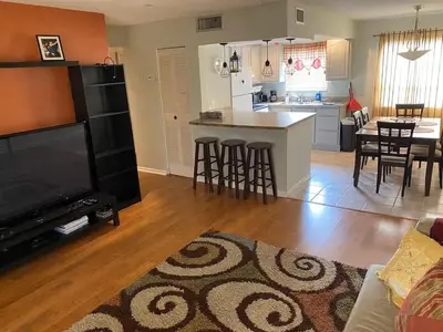 a large living room with a kitchen and a living room at Econoroom Hollywood in Hollywood
