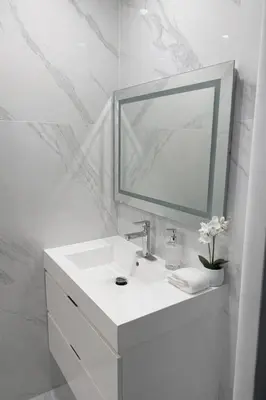 a white bathroom with a sink and a mirror at Villa Miami Lakes in Hialeah
