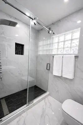 a white bathroom with a shower and a toilet at Villa Miami Lakes in Hialeah