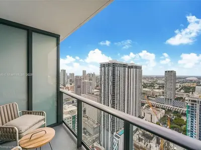 a balcony with a view of a city at Experience Miami Vibes in the Heart of Downtown in Miami