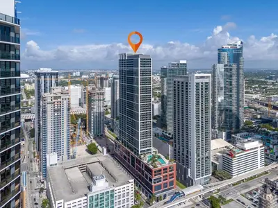an overhead view of a city with a marker on top of buildings at Experience Miami Vibes in the Heart of Downtown in Miami