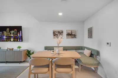 a dining room with a table and chairs at Experience Miami Vibes in the Heart of Downtown in Miami
