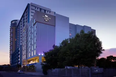 a building with a sign on the side of it at Homewood Suites by Hilton Miami Downtown/Brickell in Miami