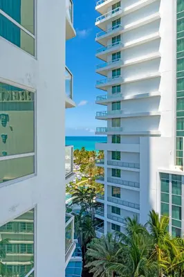 a view of the ocean from between two buildings at FontaineBleau Suite at Miami Beach in Miami Beach