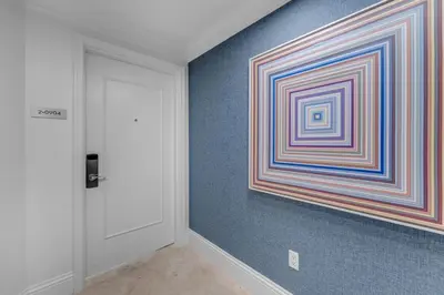 a room with a colorful painting on the wall at FontaineBleau Suite at Miami Beach in Miami Beach