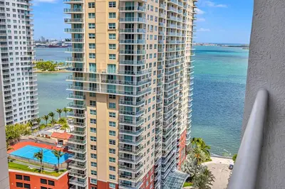 an aerial view of a large building next to the ocean at Central Unit in Heart of Brickell in Miami