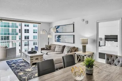 a living room with a couch and a table at Spacious 1 Bed 1 BTH Brickell Ocean View in Miami
