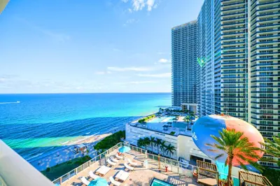 a view of the beach and ocean from a building at Oceanfront Retreat Scenic Views & Coastal Comfort in Hollywood