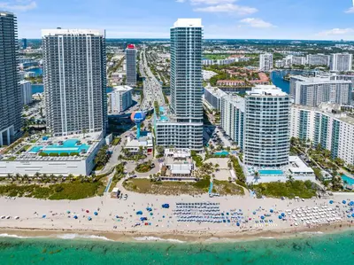 an aerial view of a beach at a resort at Oceanfront Retreat Scenic Views & Coastal Comfort in Hollywood