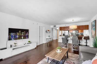 a living room with a couch and a table at Relaxing 1-Bed Condo With City Views in Brickell Key in Miami
