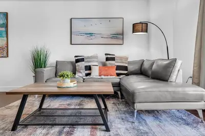 a living room with a couch and a coffee table at Relaxing 1-Bed Condo With City Views in Brickell Key in Miami