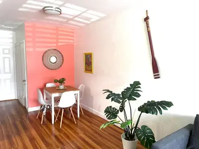 a living room with a table and a dining room at Apartment in the Heart of Calle 8 with Parking in Miami