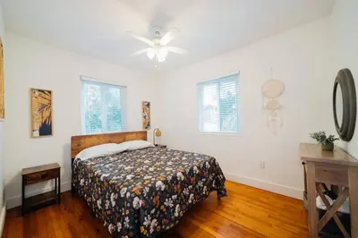 a bedroom with a bed and a ceiling fan at Families Welcome 3 Bedroom Oasis with Parking in Miami