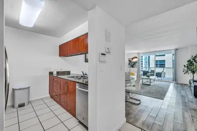 an open kitchen with a view of a living room at Brickell 1 Bed 1 Bath Free Parking in Miami