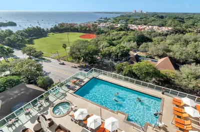 an overhead view of a swimming pool at a resort at Private Residences at Hotel Arya by SoFLA Vacations in Miami