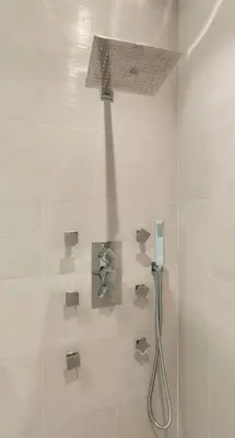 a bathroom with a shower with a shower head at Stylish Bedroom Suite in Pembroke Pines