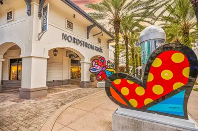 a heart statue in front of a building at Midblock Midtown Miami High Floor 1B Suite W Spa Pool Gym in Miami
