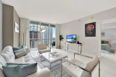 a living room with a couch and a table at Luxurious 5-STAR condo at the ICON Brickell in Miami