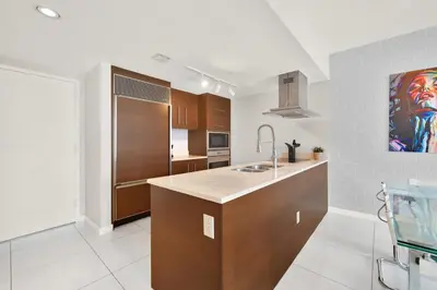 a kitchen with a sink and a counter top at Luxurious 5-STAR condo at the ICON Brickell in Miami