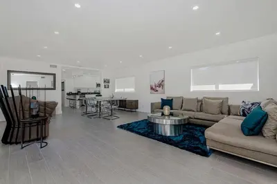 a living room with a couch and a table at Stylish Apartment at Brickell ,Free Parking in Miami