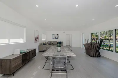 a living room with a table and a couch at Stylish Apartment at Brickell ,Free Parking in Miami